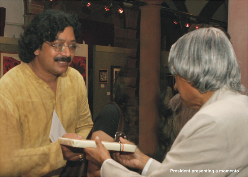 President presenting a momento